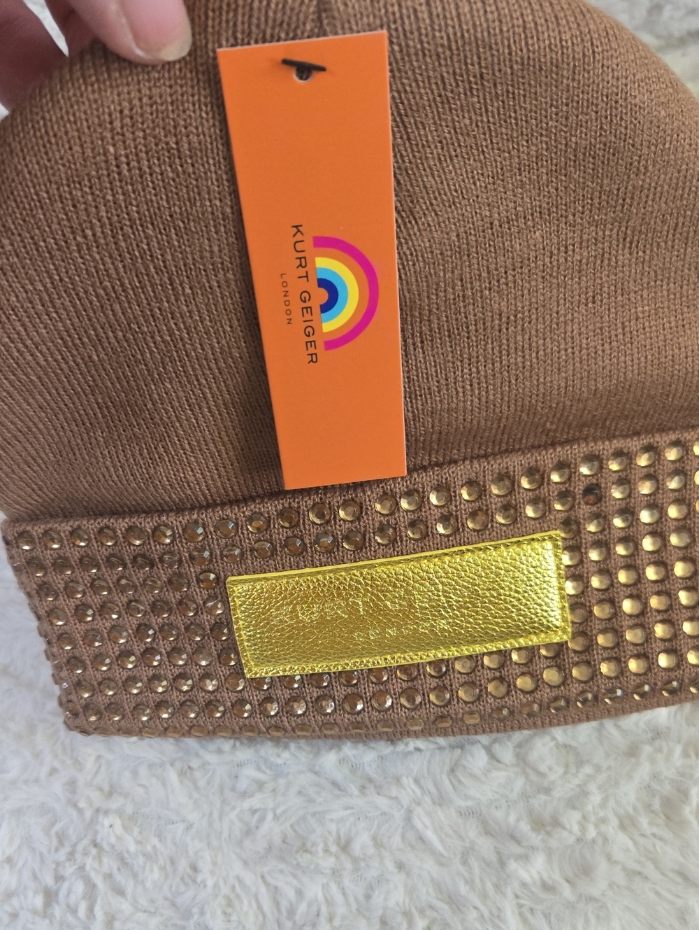 Kurt Geiger Tan Beanie with Gold Studs and Metallic Patch
